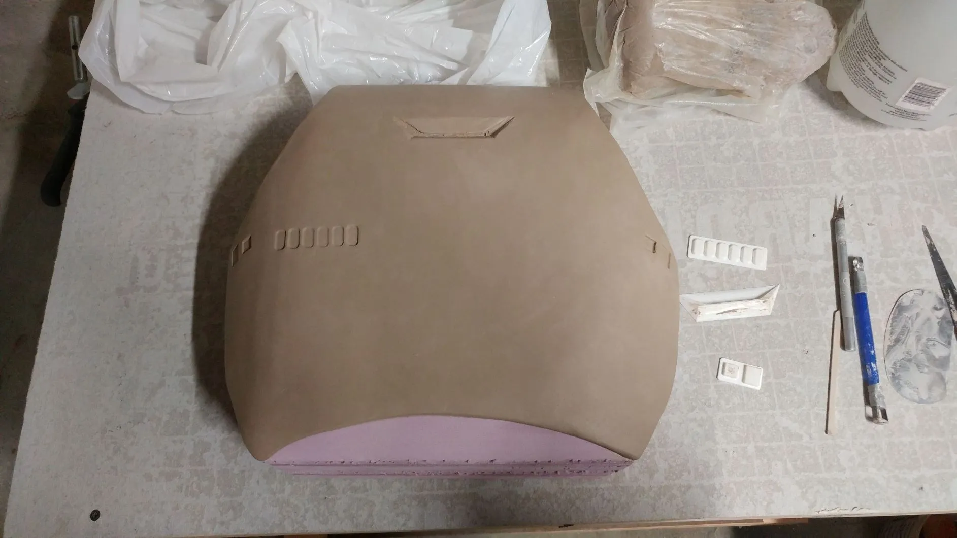 clay-over-foam-buck
